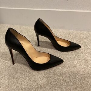 Christian Louboutin black leather pumps
